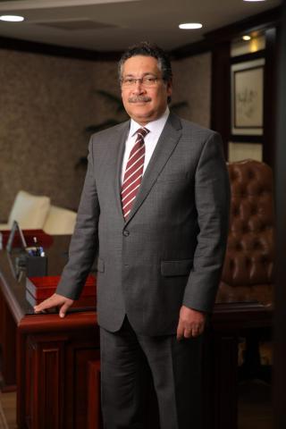 حسن غانم رئيس مجلس الإدارة والعضو المنتدب لبنك التعمير والإسكان