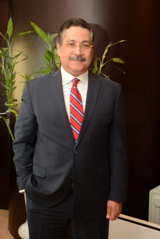 حسن غانم رئيس مجلس الإدارة والرئيس التنفيذى لبنك التعمير والإسكان 
