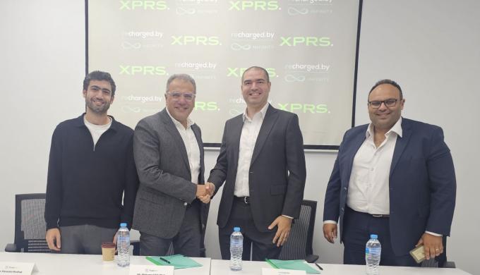 تحالف بين Recharged By Infinity وسلسلة متاجر XPRS لإتاحة حلول شحن السيارات الكهربائية بالتقسيط