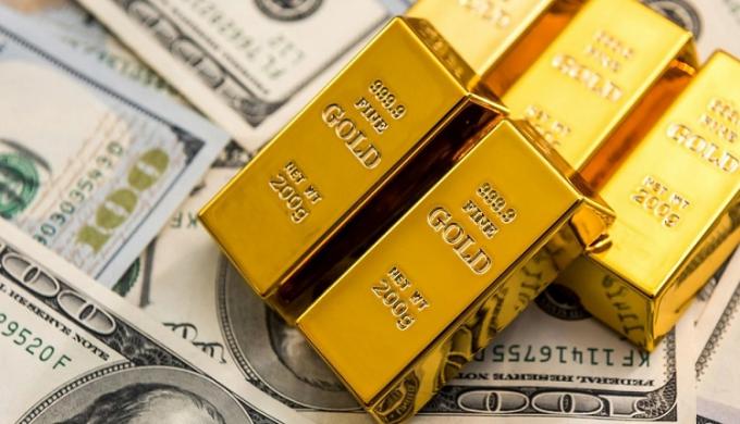 الذهب يرتفع مع تراجع النفط بعد تأجيل ترامب شن هجوم على إيران