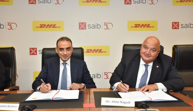 بنك saib يوقع شراكة مع »دي اتش ال اكسبرس«لتطبيق مبادرة «Go Green Plus»